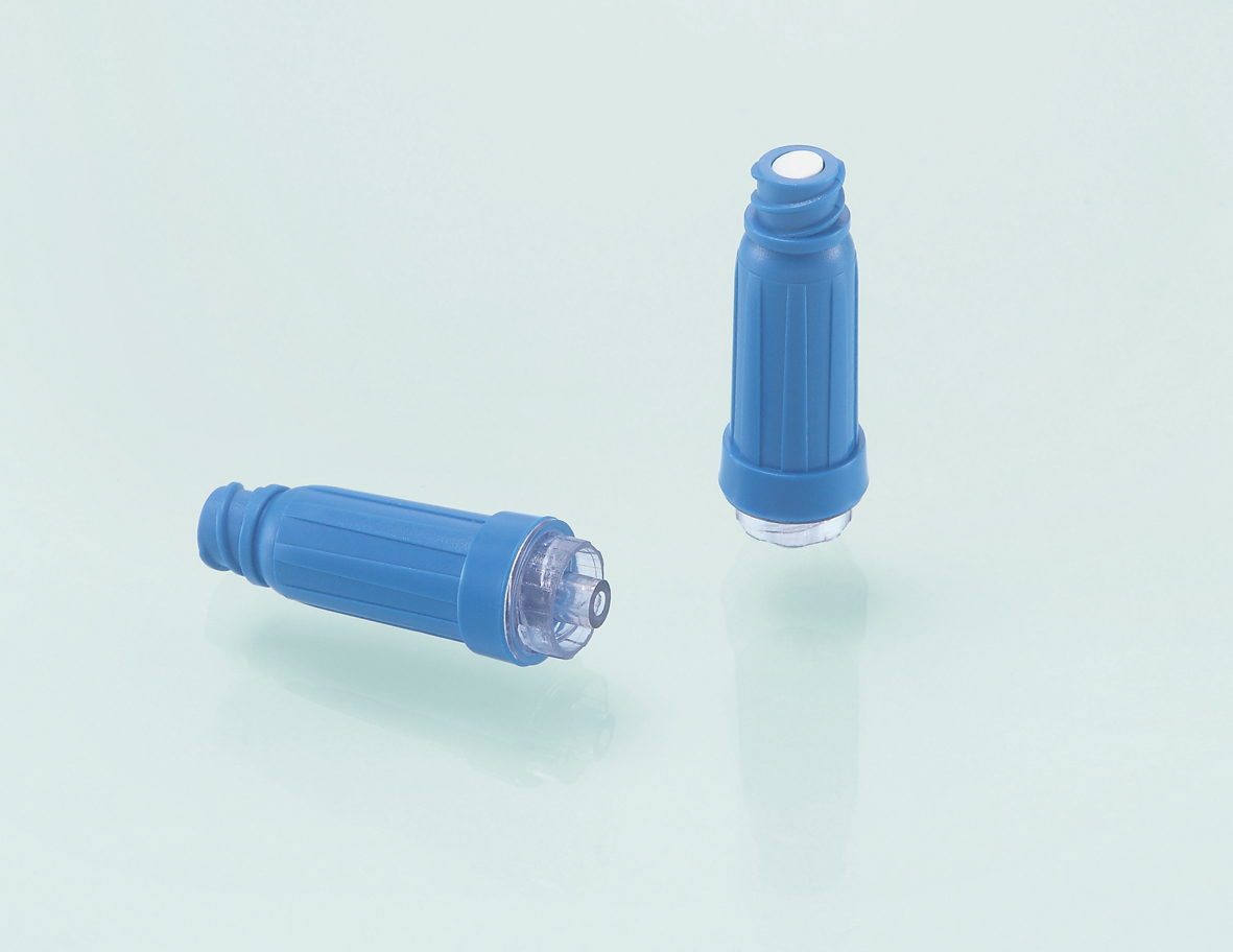 Positive pressure needle free connector